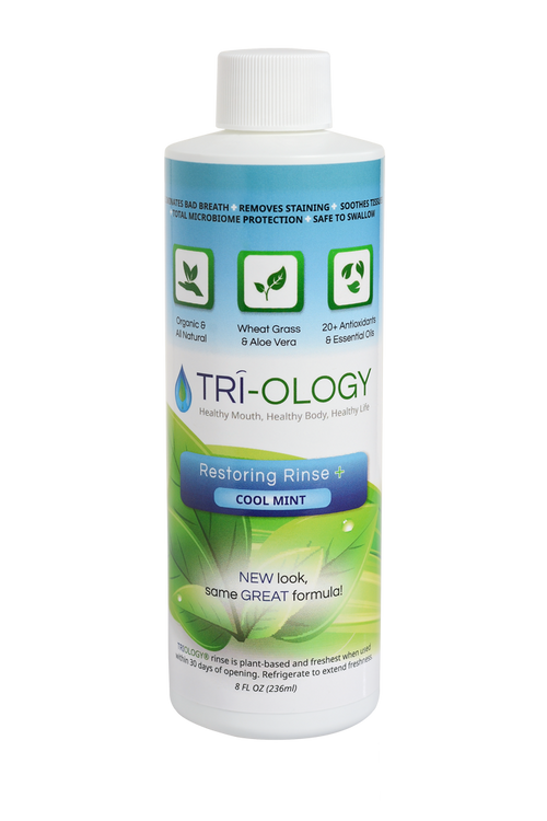 Front view of RESTORING RINSE® botanical alcohol-free mouth rinse bottle